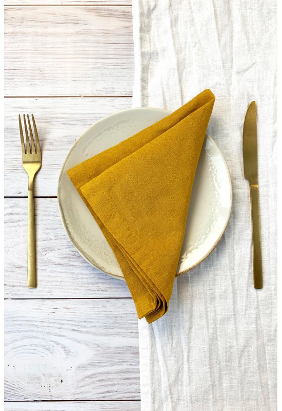 https://www.touchablelinen.com/image/cache/catalog/products/22/Linen-napkins-in-mustard-yellow-5-550x800.jpg